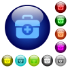 First aid kit solid color glass buttons - First aid kit solid icons on round glass buttons in multiple colors. Arranged layer structure