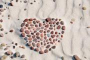 Lovely hearth shaped stones in the sand. - Heart in the sand